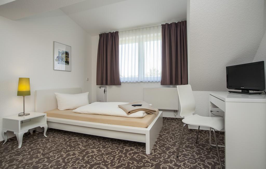 Pension Lok-Inn Walluf Rum bild